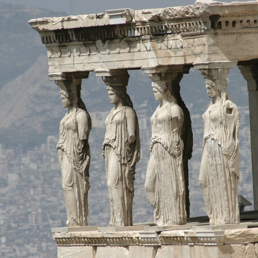 Greek tempe with close ups of pillars shaped like women.