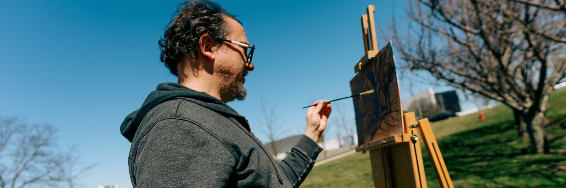 art student Chris Gutierrez painting