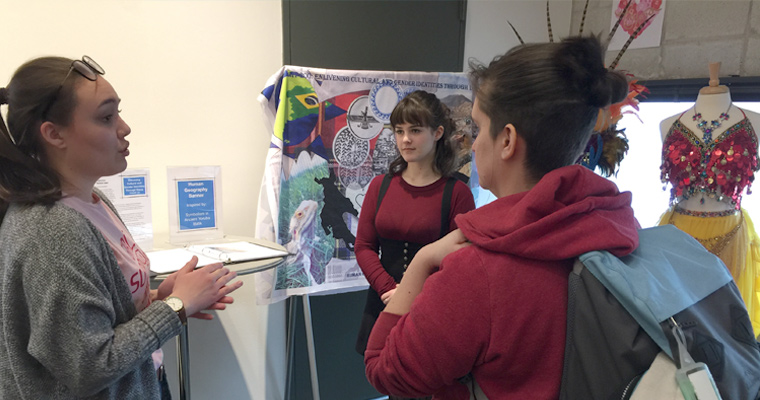 Performing arts students explain tapestry and textiles during launch of Humanities Hub