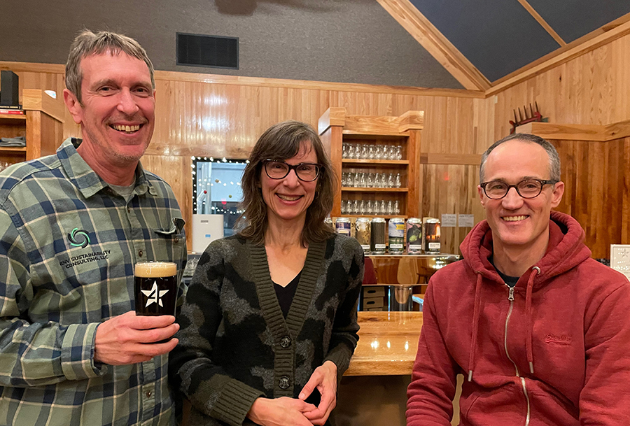 (From left) Rob Vandenabeele of EcoFriendlyBeerDrinker, Professor Vesela Veleva, and grad assistant Kevin Bleau at Four Star Farms in Northfield, MA.