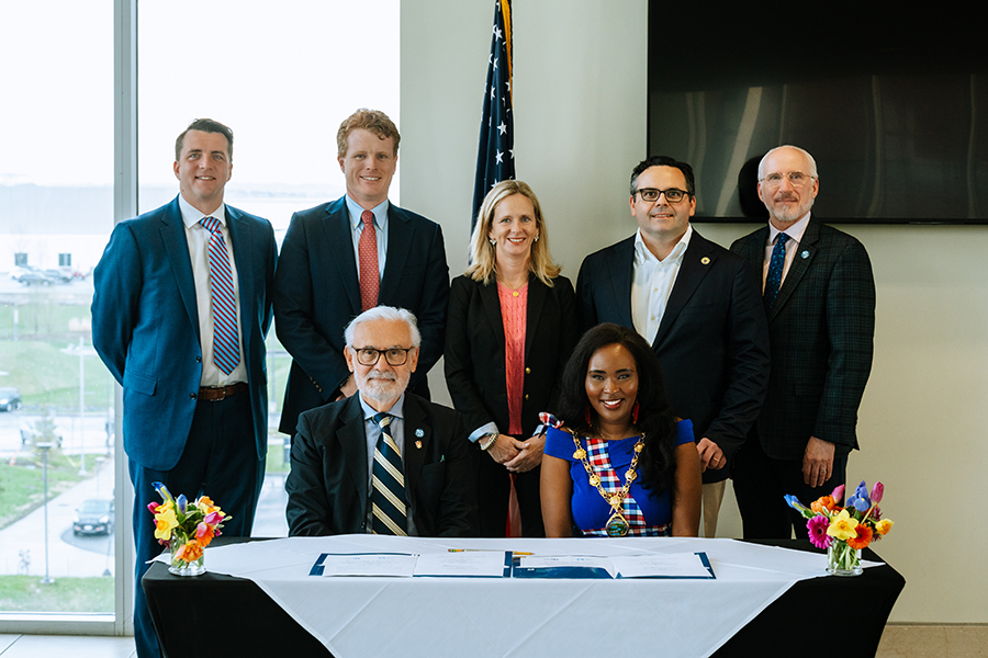Derry City Mayor Lilian Seenoi-Barr, Chancellor Suárez-Orozco and officials at the mou signing