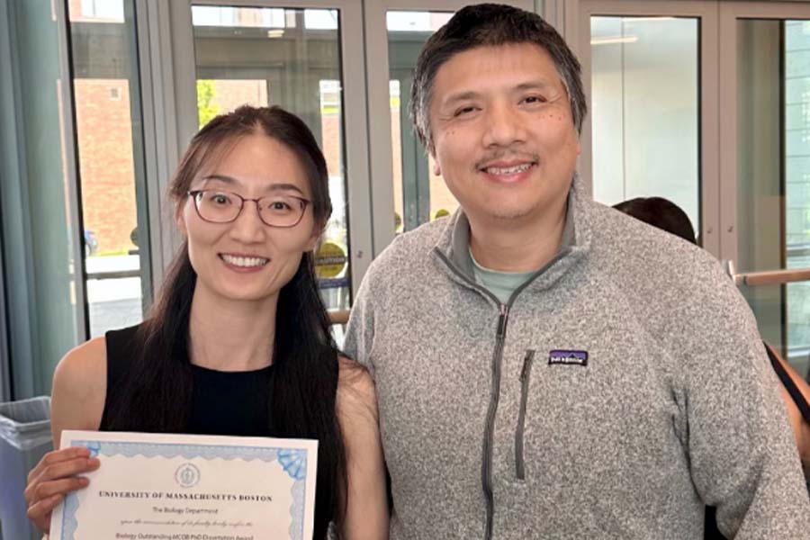 Changmeng Cai Biology Professor with PHD Student Dissertation