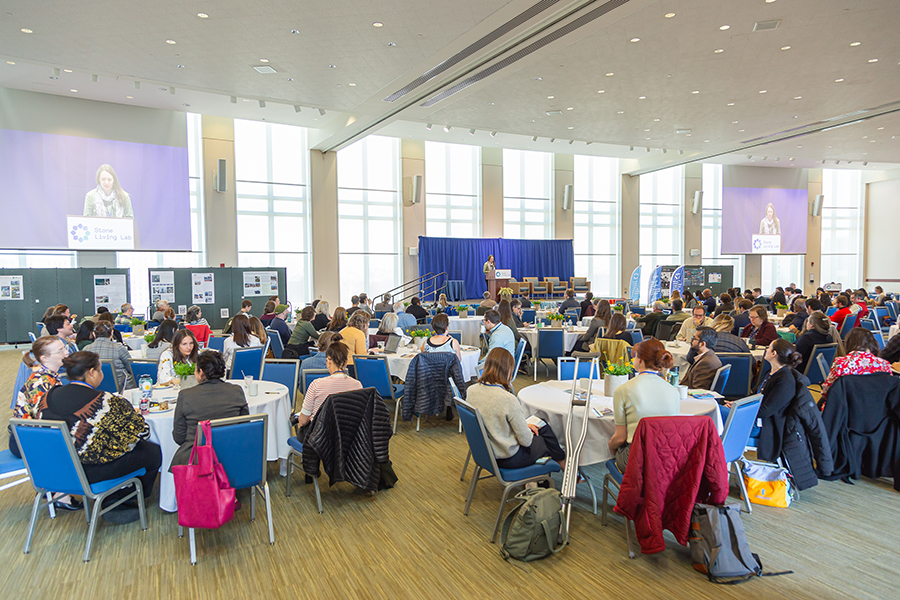 Speaker talks to the audience at the Stone Living Lab conference.
