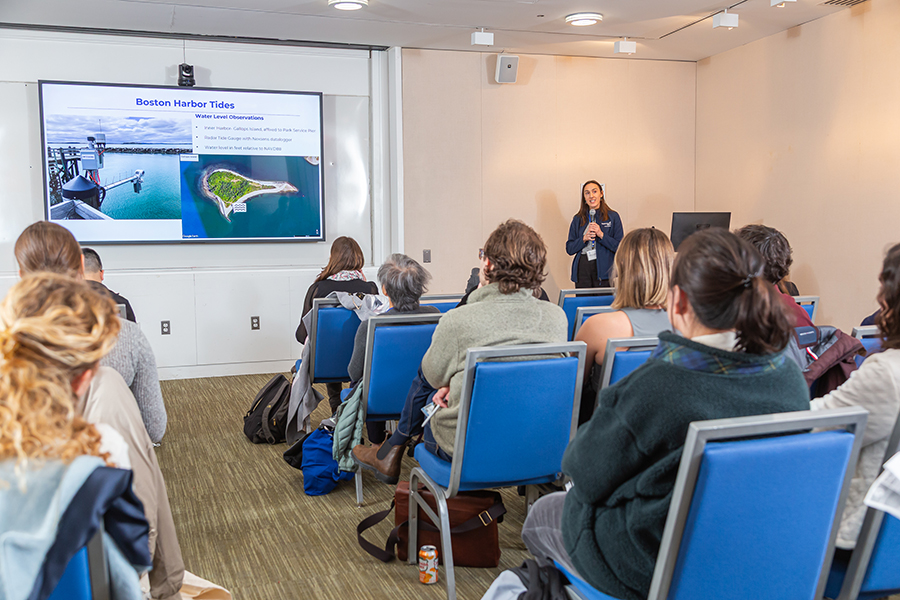 Speaker talks to the audience at the Stone Living Lab conference.