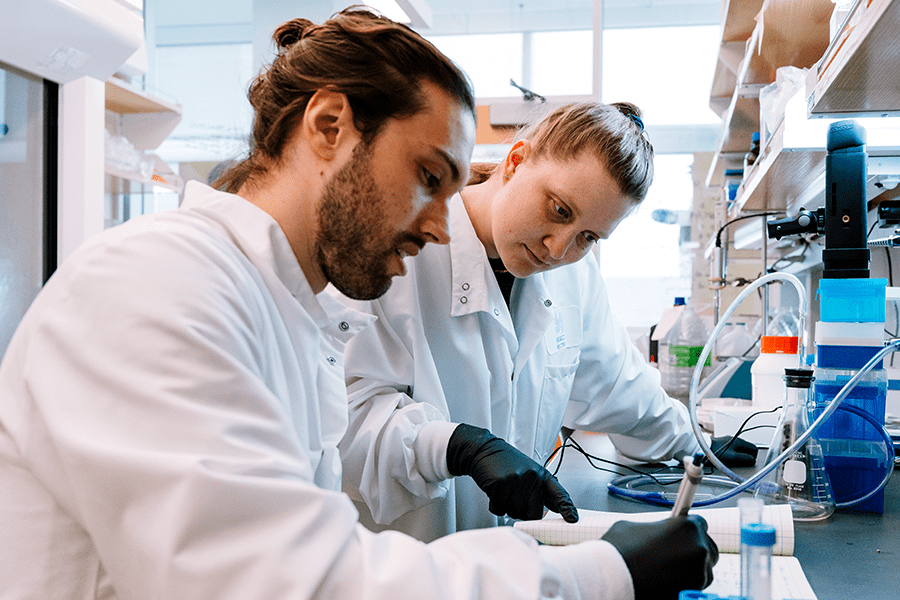 Male and Female students in lab